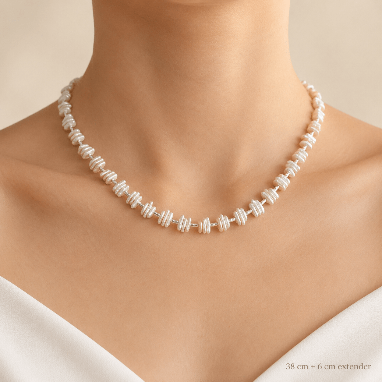 Baroque Pearl Necklace shown on the neckline with a 38 cm chain and 6 cm extender