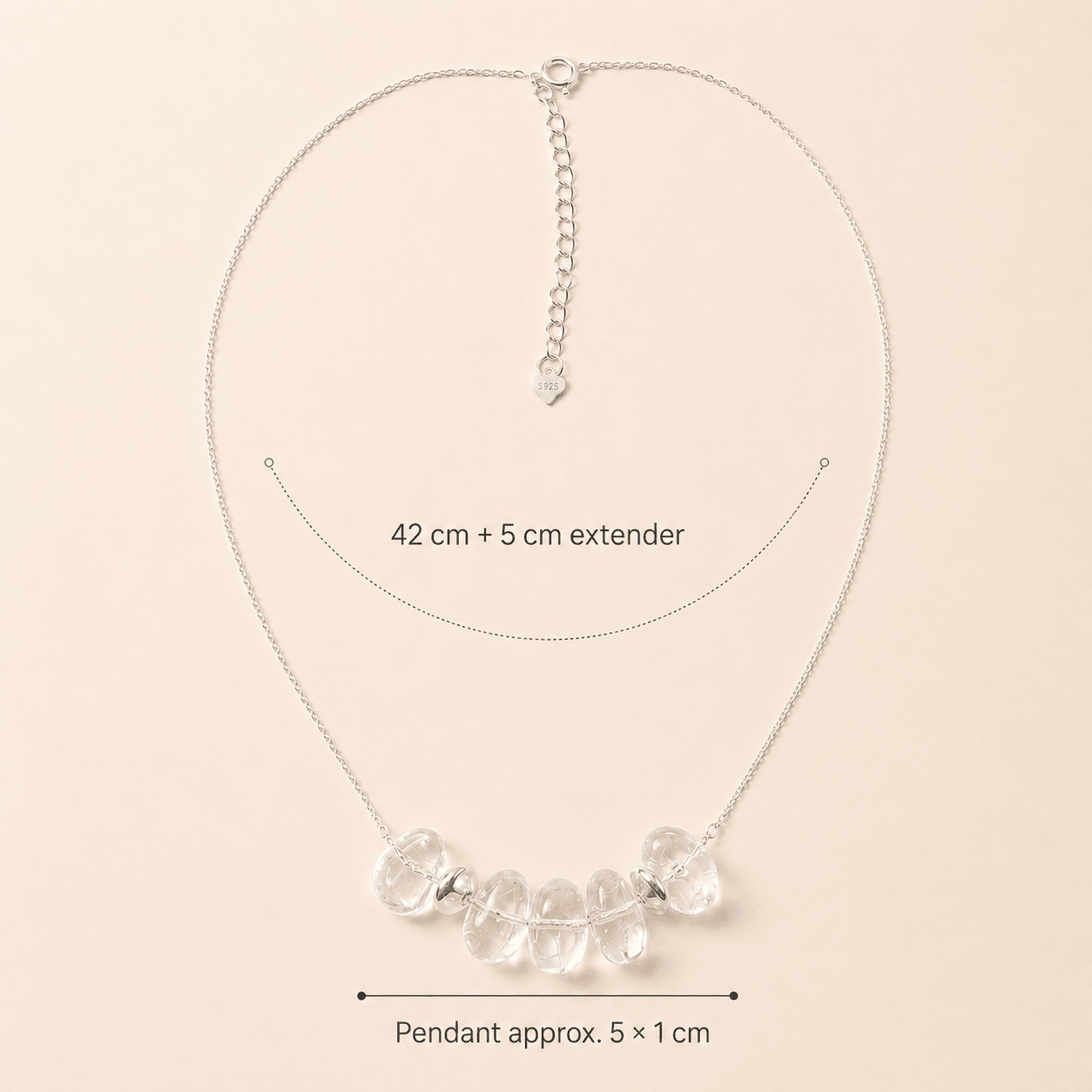 Clear Quartz Pendant Necklace size guide showing a 42 cm chain, 5 cm extender, and pendant size of approximately 5 x 1 cm