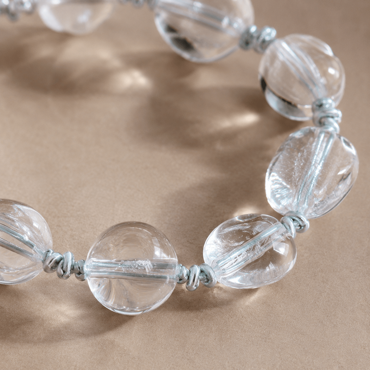 Close-up of clear quartz and sterling silver bead details by LUNARAE