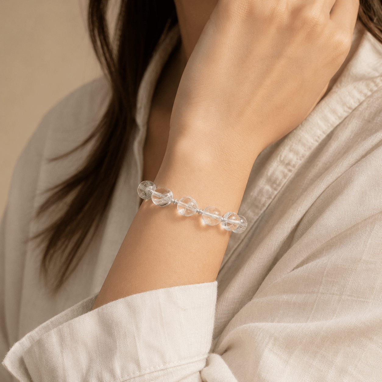 Model wearing Clear Quartz Silver Bead Bracelet by LUNARAE
