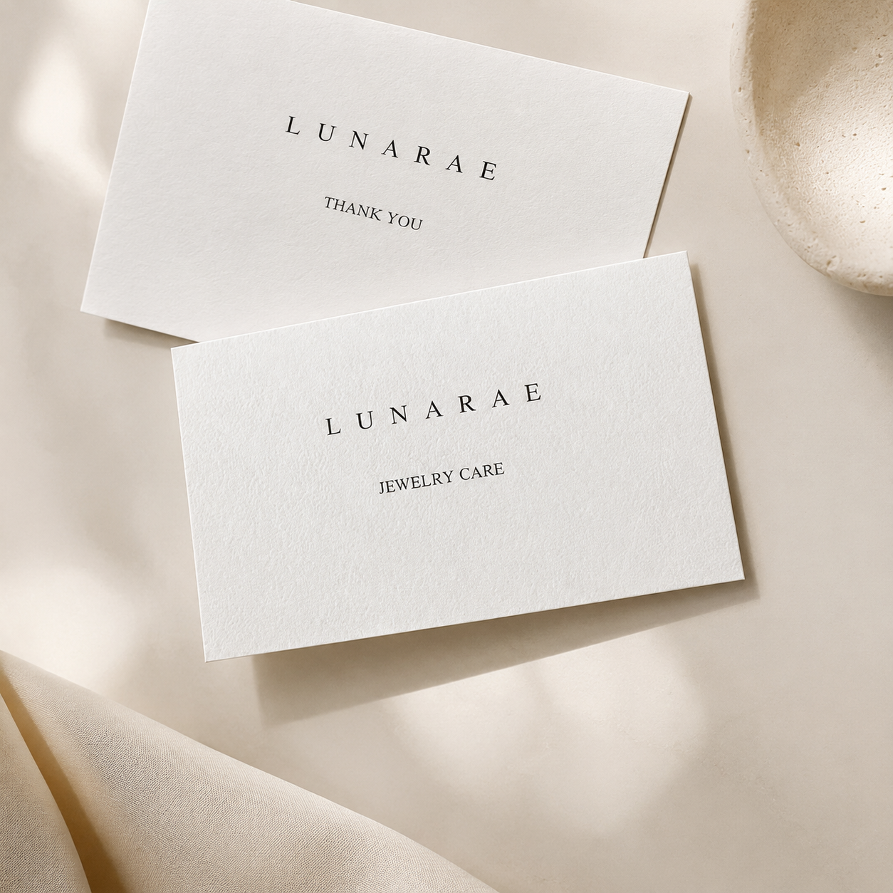 LUNARAE jewelry care card with simple guidance for natural stones, pearls, and 925 silver elements