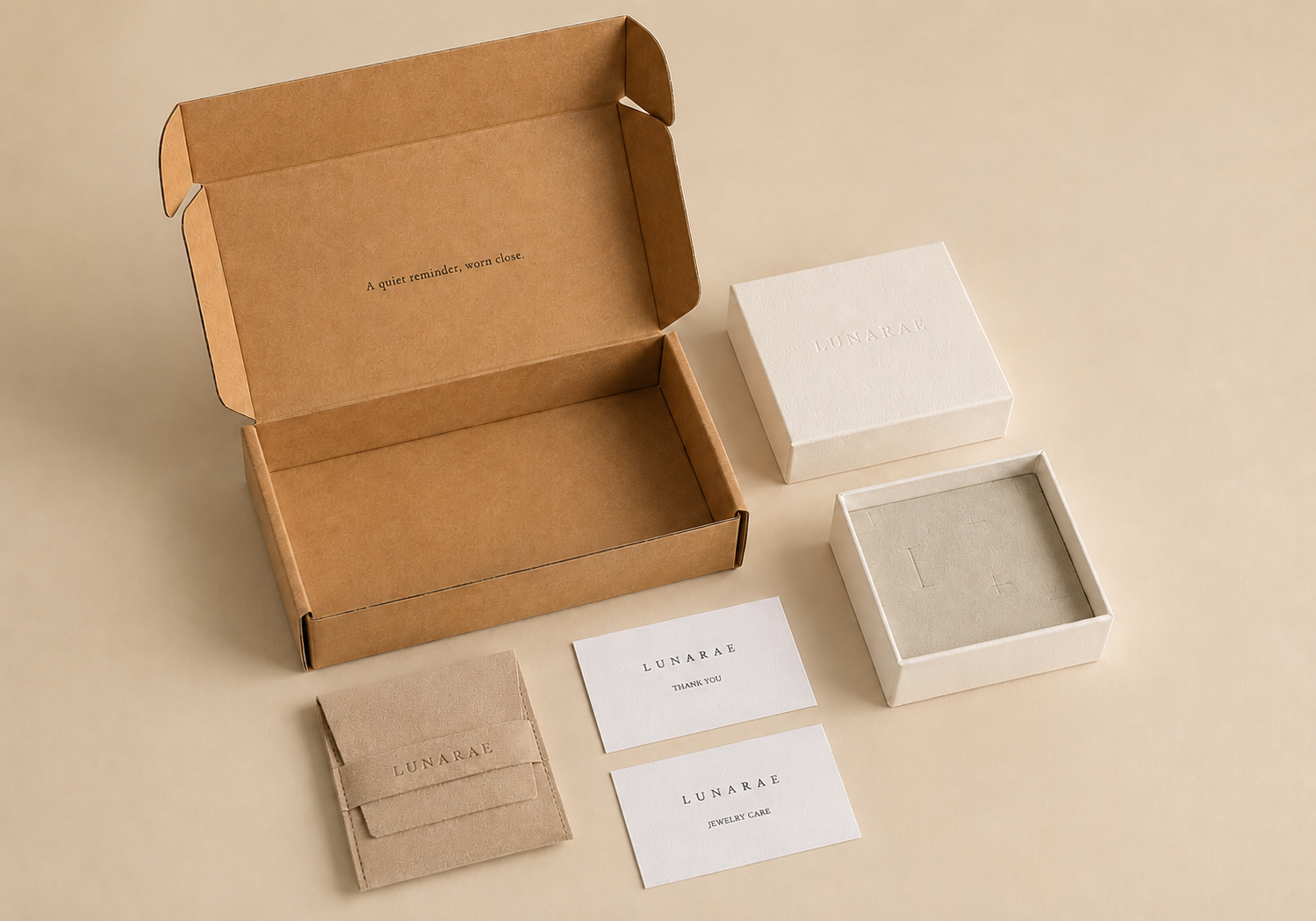 LUNARAE gift-ready jewelry packaging with kraft shipping box, jewelry box, suede pouch, care card and thank-you card