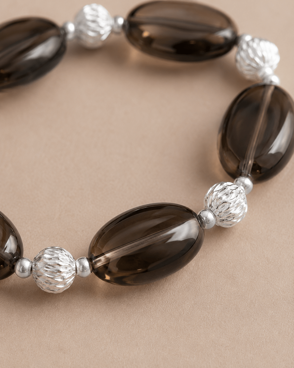 Close-up of smoky quartz and sterling silver details by LUNARAE