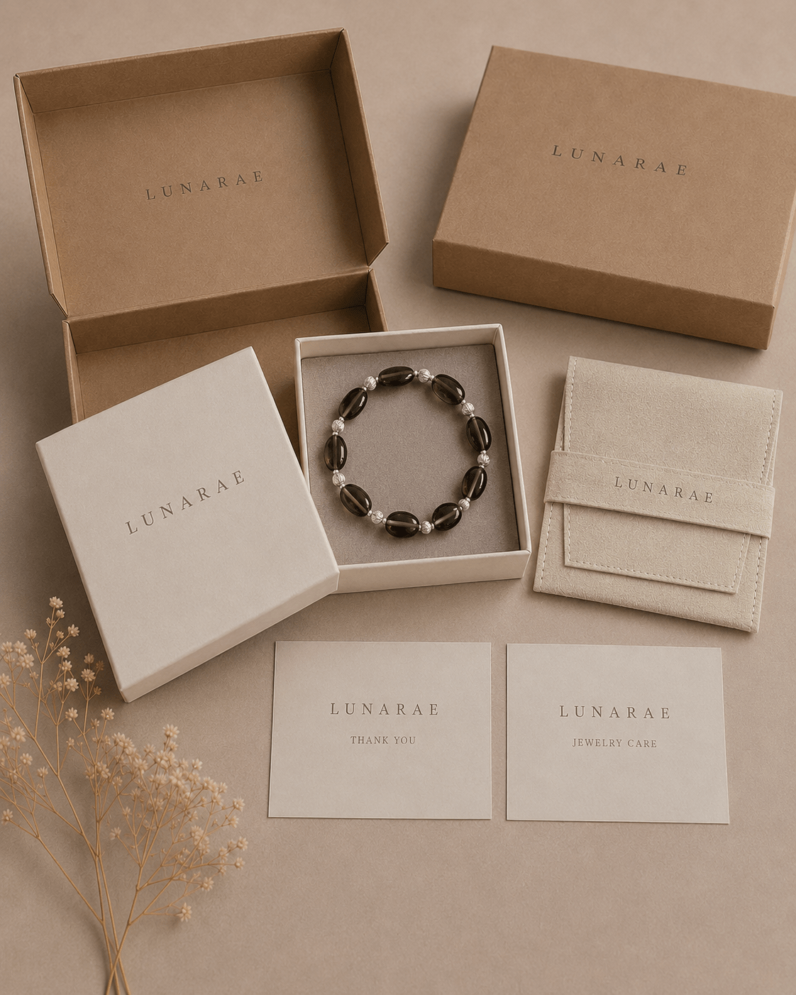 LUNARAE jewelry packaging with smoky quartz bracelet