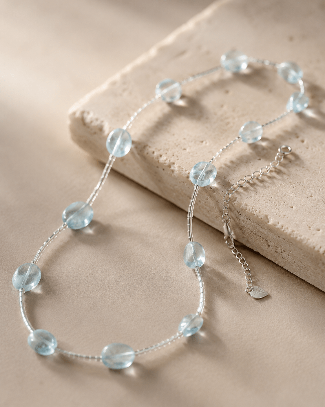 Close-up of aquamarine and sterling silver tube details by LUNARAE