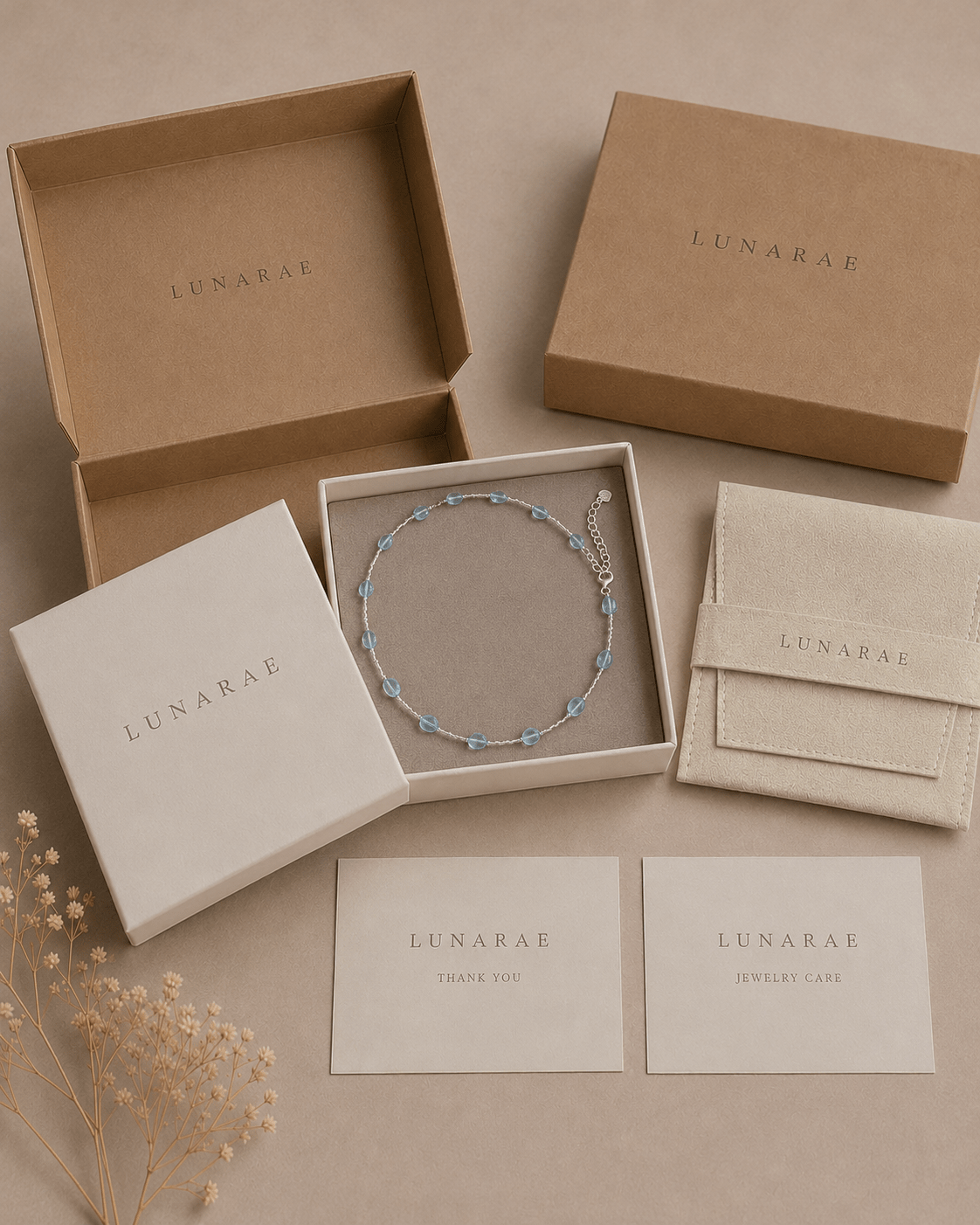 LUNARAE jewelry packaging with aquamarine necklace
