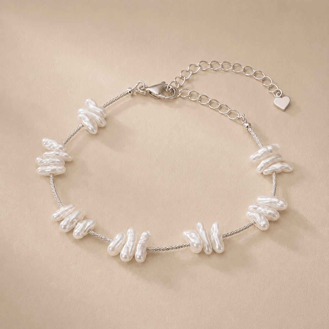 Baroque Pearl Bracelet shown from an alternate flat-lay angle with the clasp, extender chain, and clustered baroque pearls visible