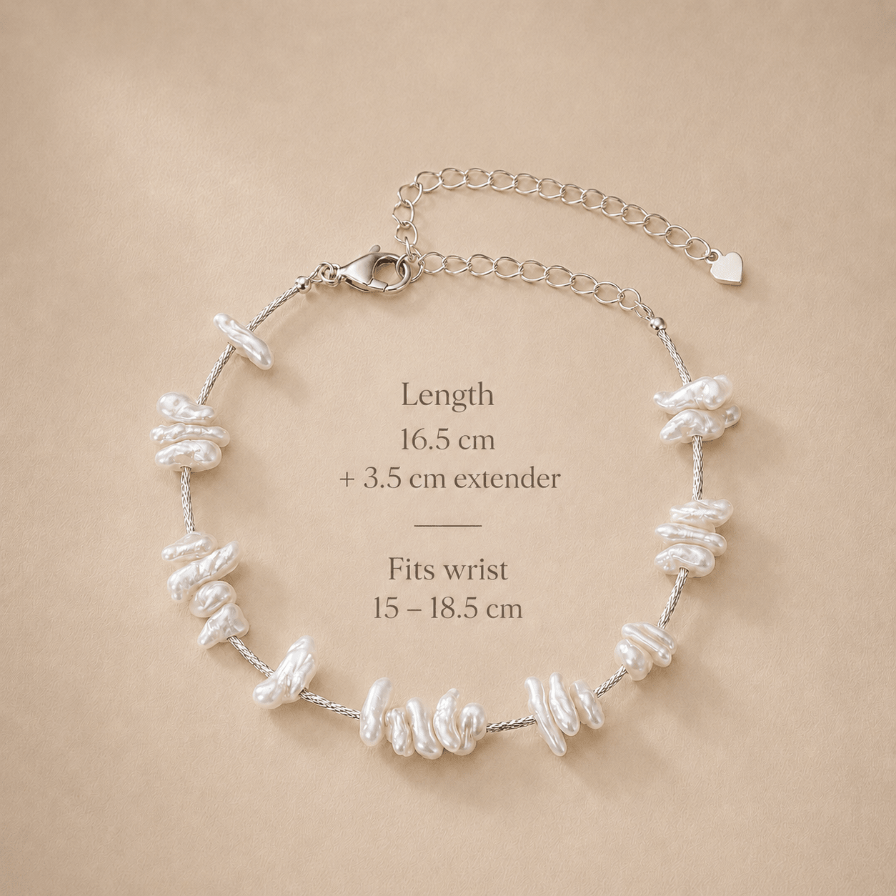 Baroque Pearl Bracelet size and fit guide showing a 16.5 cm length, a 3.5 cm extender, and a wrist fit range of 15 to 18.5 cm