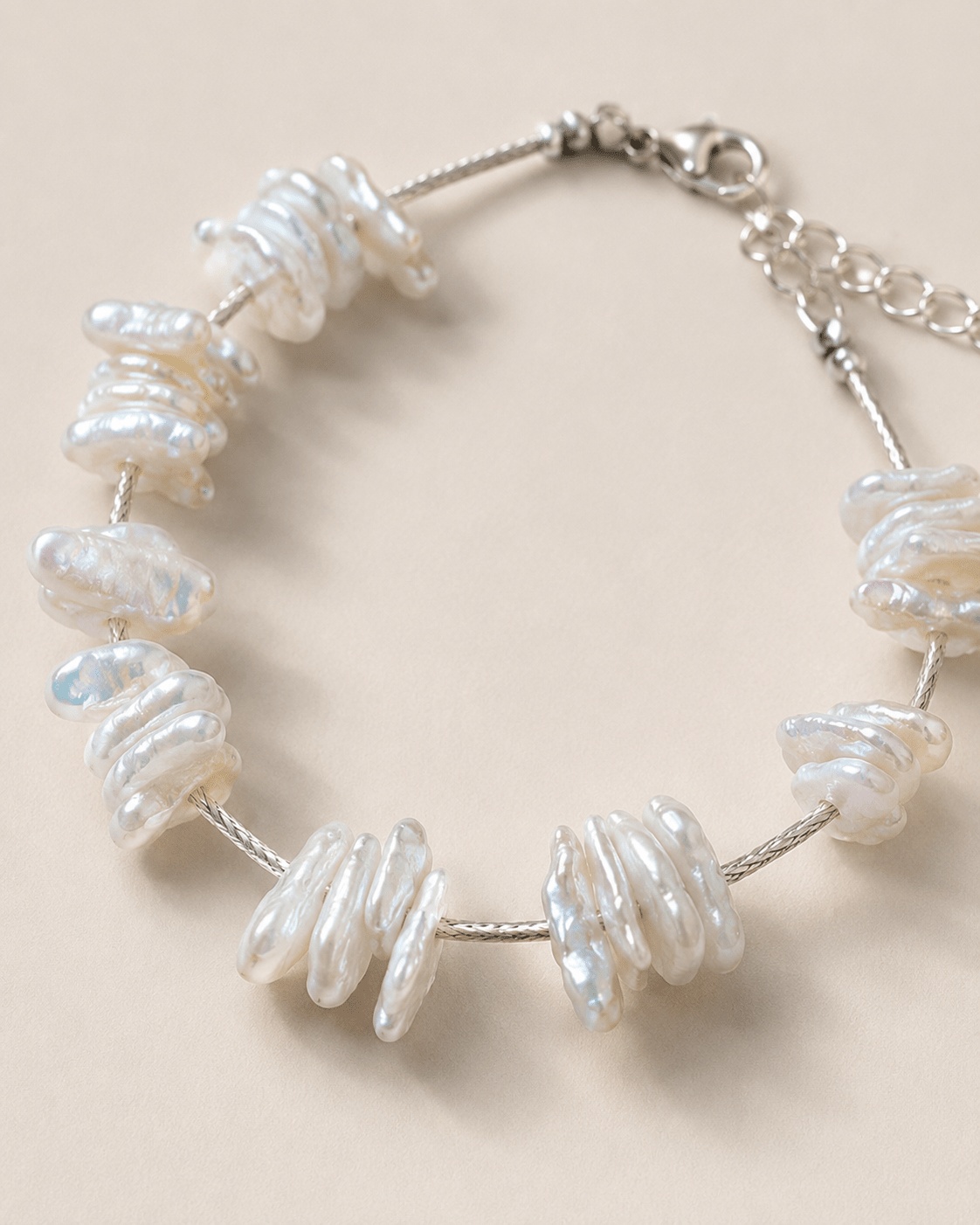 Close-up of baroque pearl and sterling silver details by LUNARAE