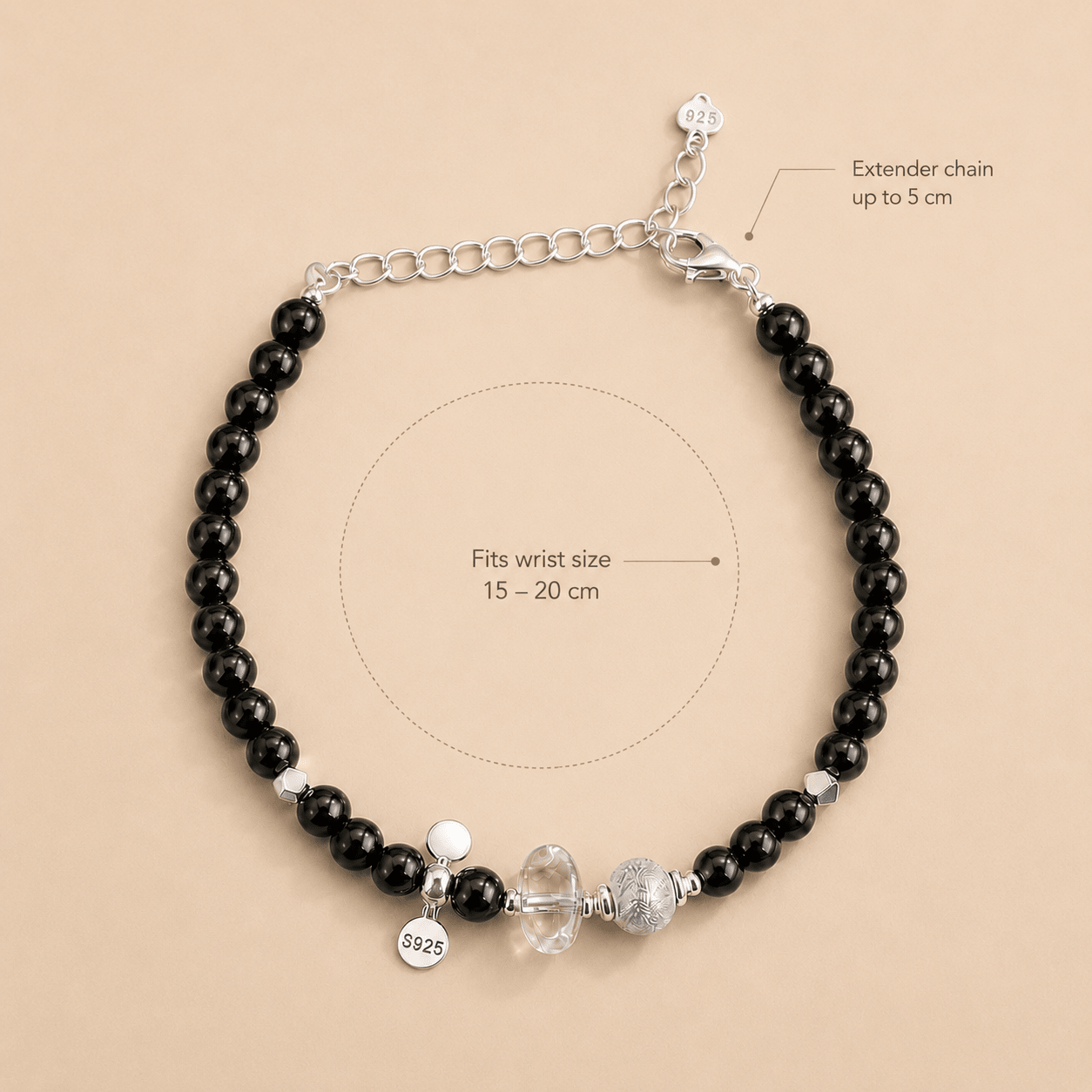 Black Onyx and Clear Quartz Bracelet size and fit guide showing an extender chain up to 5 cm and a wrist fit range of 15 to 20 cm