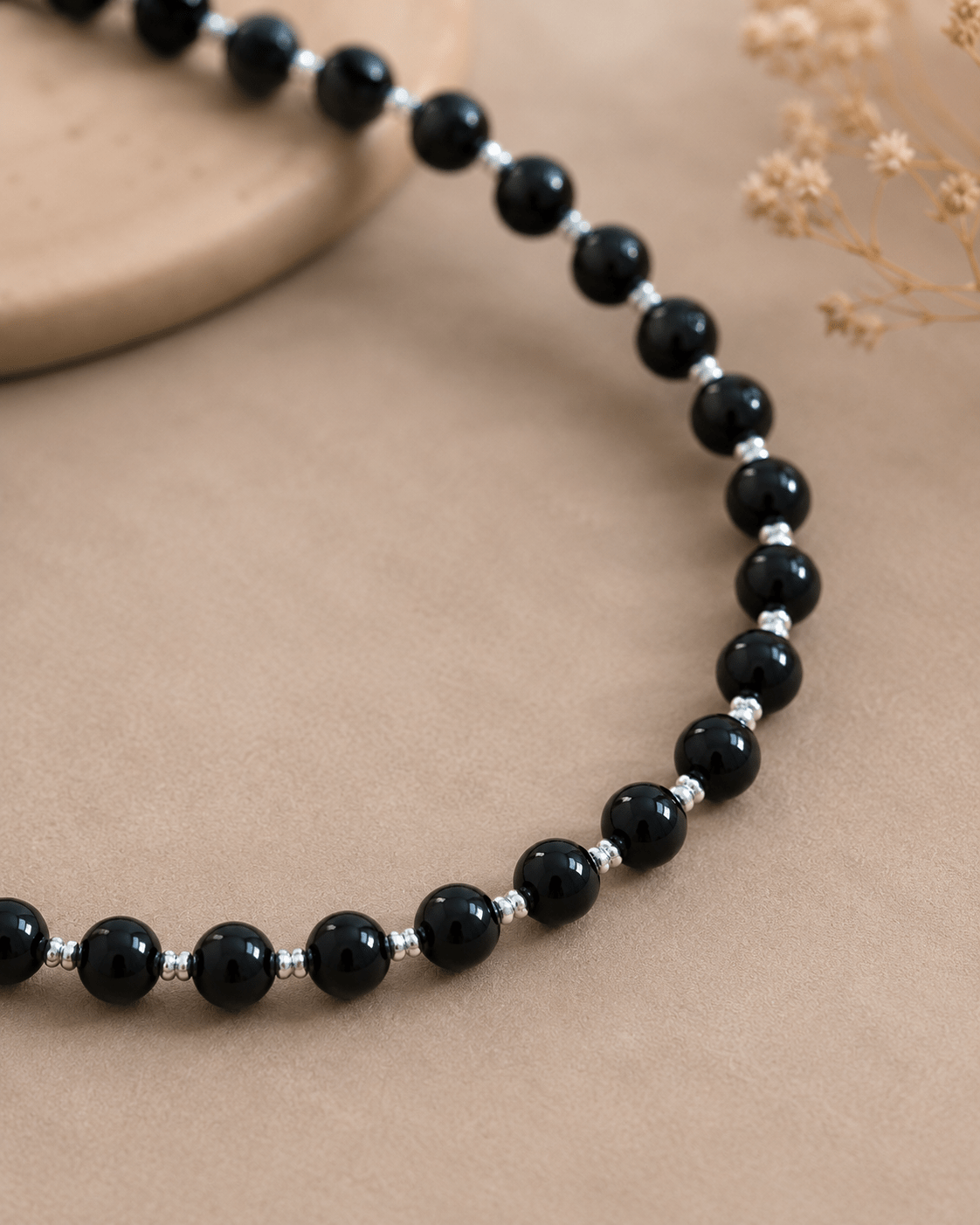 Close-up of black onyx and sterling silver bead details by LUNARAE