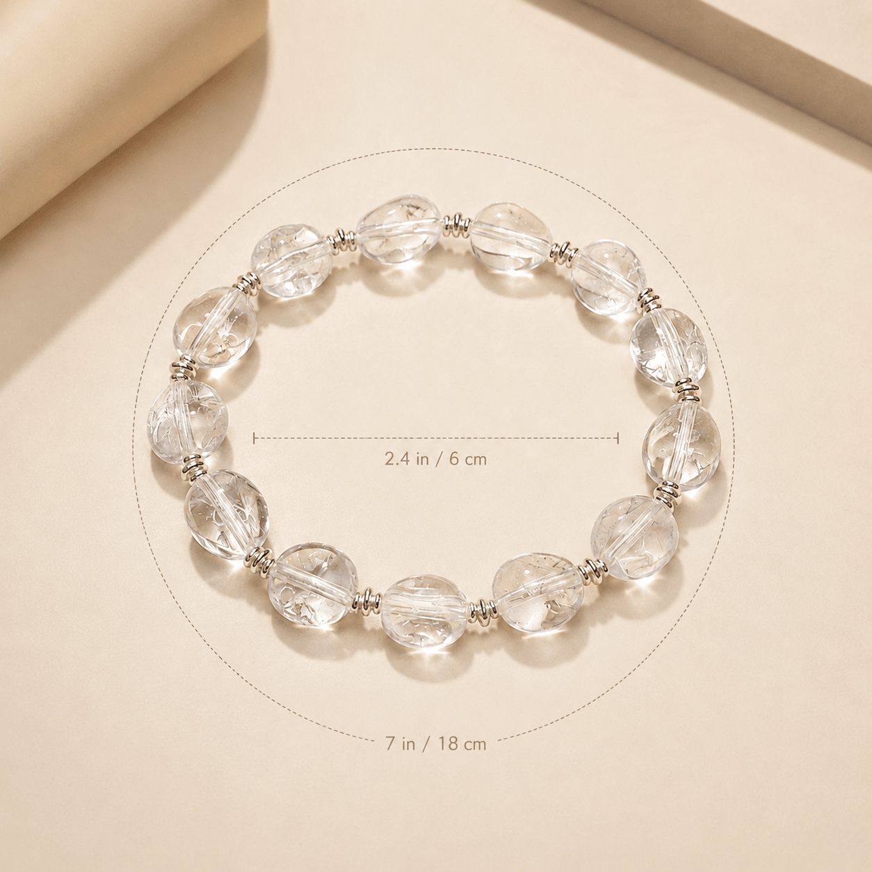 Clear Quartz Silver Bead Bracelet size guide showing an inner diameter of 2.4 in / 6 cm and a bracelet circumference of 7 in / 18 cm
