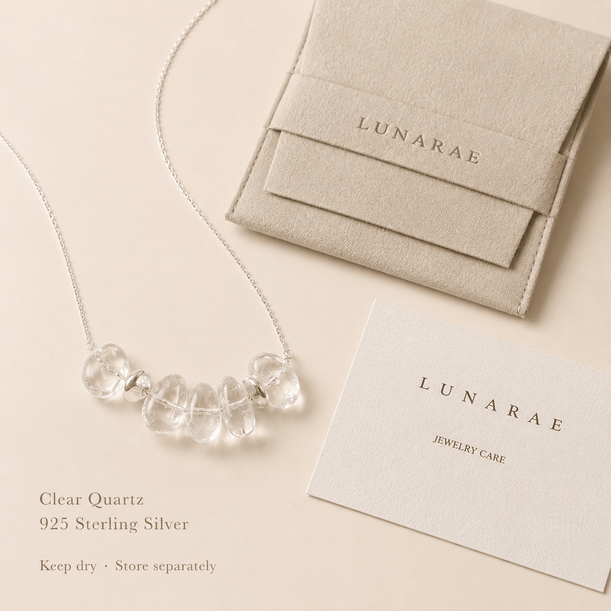 Clear Quartz Pendant Necklace displayed with a LUNARAE pouch and jewelry care card, highlighting clear quartz, 925 sterling silver, and basic care instructions
