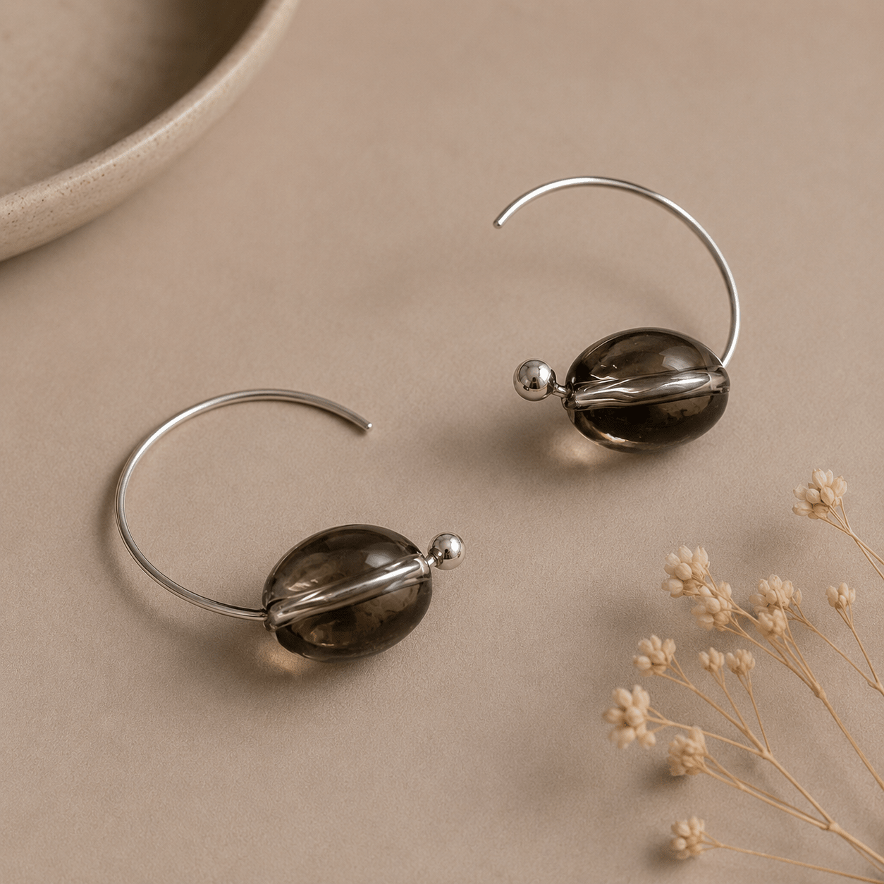 Close-up of smoky quartz and sterling silver earring details by LUNARAE
